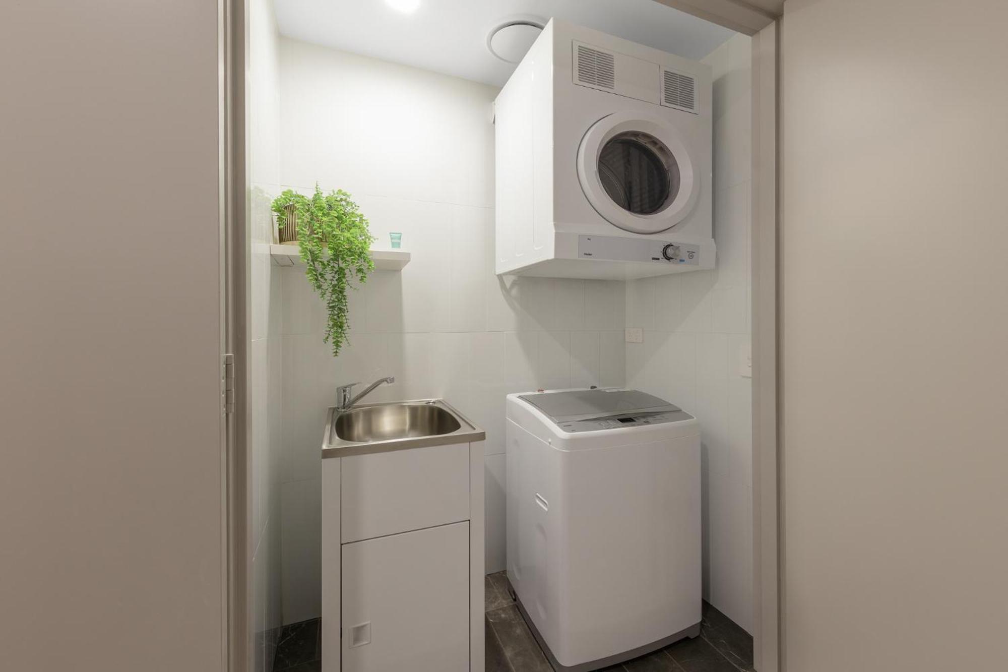 Meriton Suites North Sydney Exterior foto Laundry room